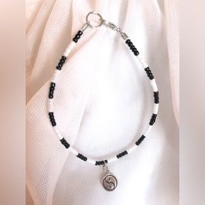 Hand beaded yin/yang bracelet